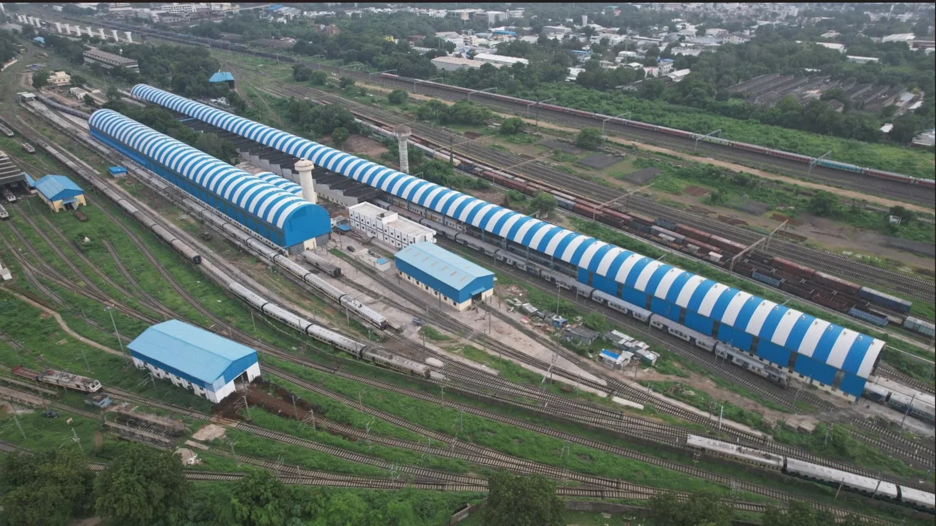 Aerial view of railway yard and maintenance shed infrastructure delivered by Neev Construction.